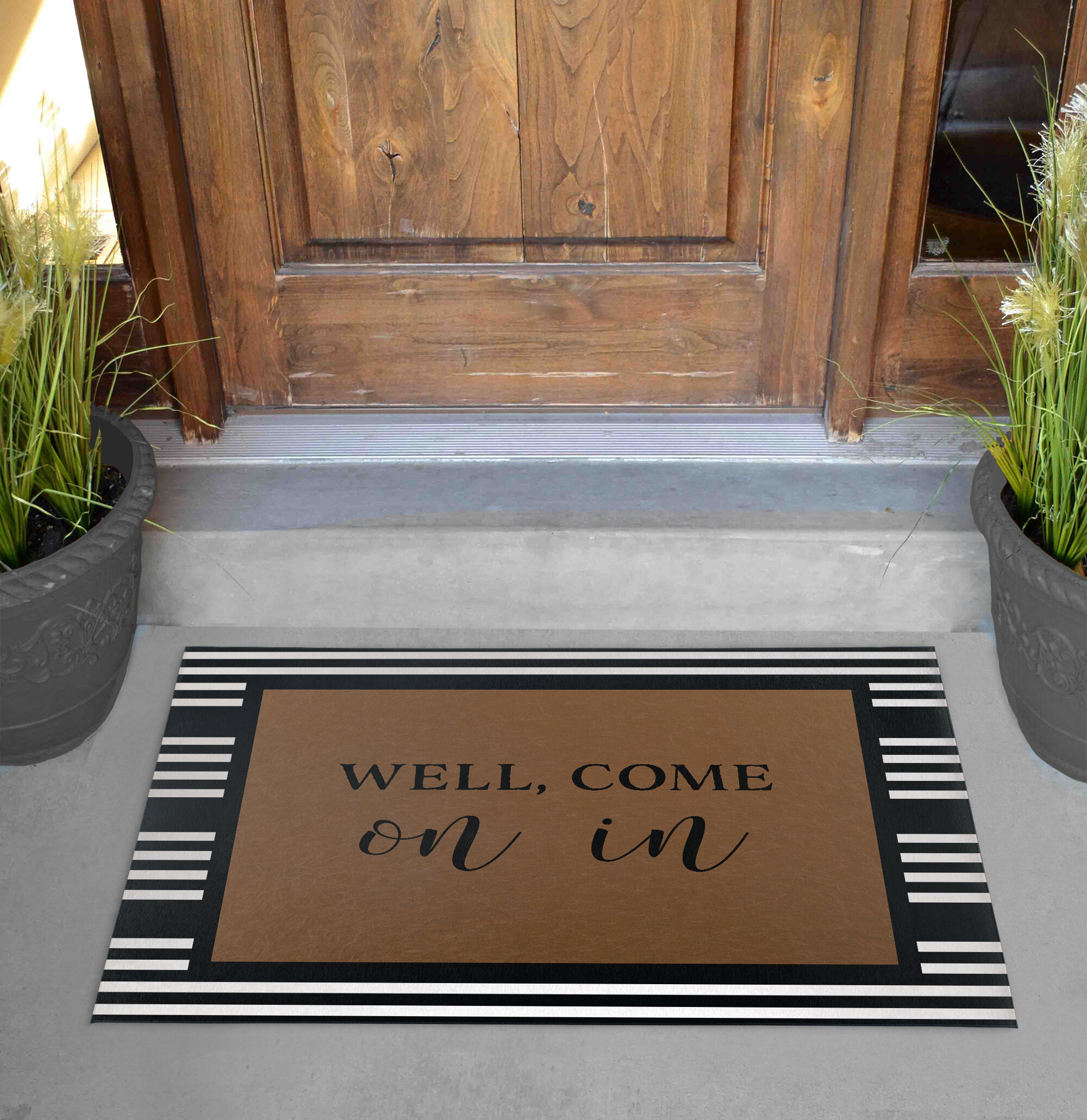 https://assets.wfcdn.com/im/65184939/compr-r85/1535/153582247/aulani-non-slip-striped-outdoor-doormat.jpg