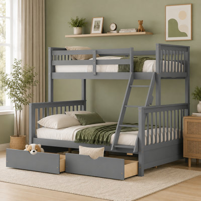 A classic "high-low" bunk bed in an understated, chic grey finish; features a single bed on top and a larger bed below, along with two storage drawers. Durable and stylish, it complements a wide range of home interiors.