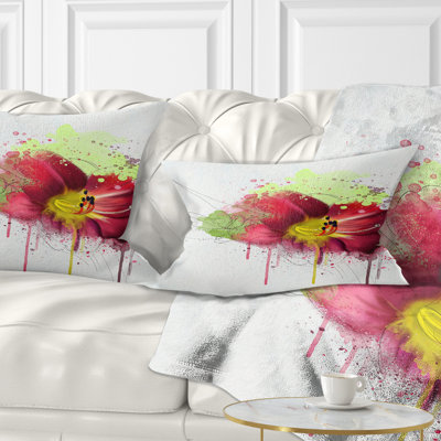 Coussin lombaire floral avec éclaboussures de peinture