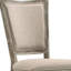 Ensemble de deux chaises de salle à manger rembourrées en tissu gris et en bois massif