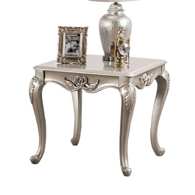 Table de bout de style traditionnel avec pieds courbés et structure sculptée en bois massif finition champagne