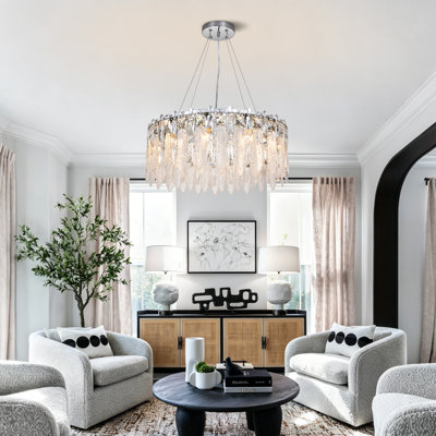 10-Light Modern Round Crystal Chandelier featuring a chrome finish and feather-textured K9 glass; a large, height-adjustable fixture (23.6 inches) with a luxurious style, suitable for dining rooms, kitchen islands, living rooms, and master bedrooms.