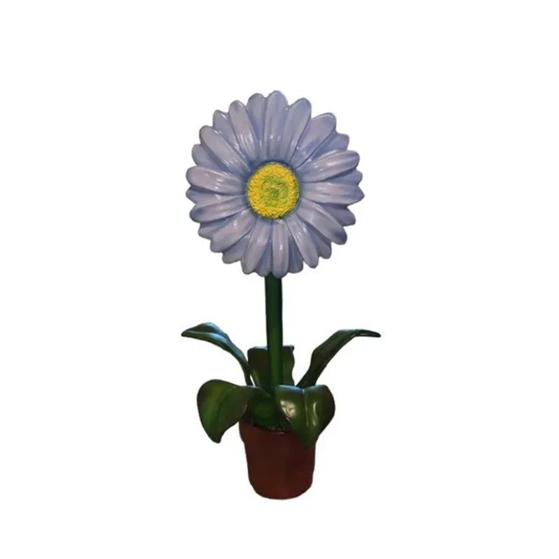 Petite statue de marguerite mauve en pot