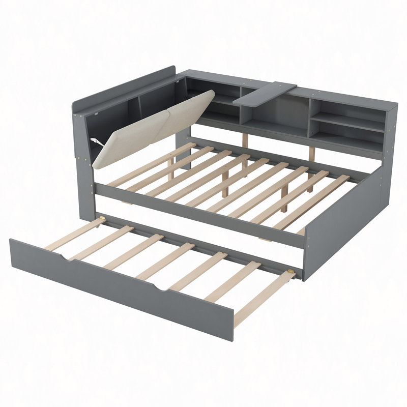 Lit plateforme en bois avec lit gigogne, tablettes et tête de lit