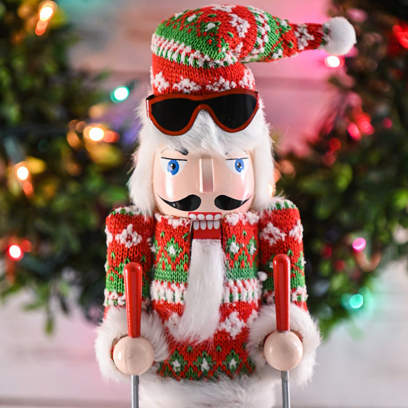 Skier Man Nutcracker – Red And Green Wooden Nutcracker Guy With Ugly Sweater And Ski Sticks In Skiing