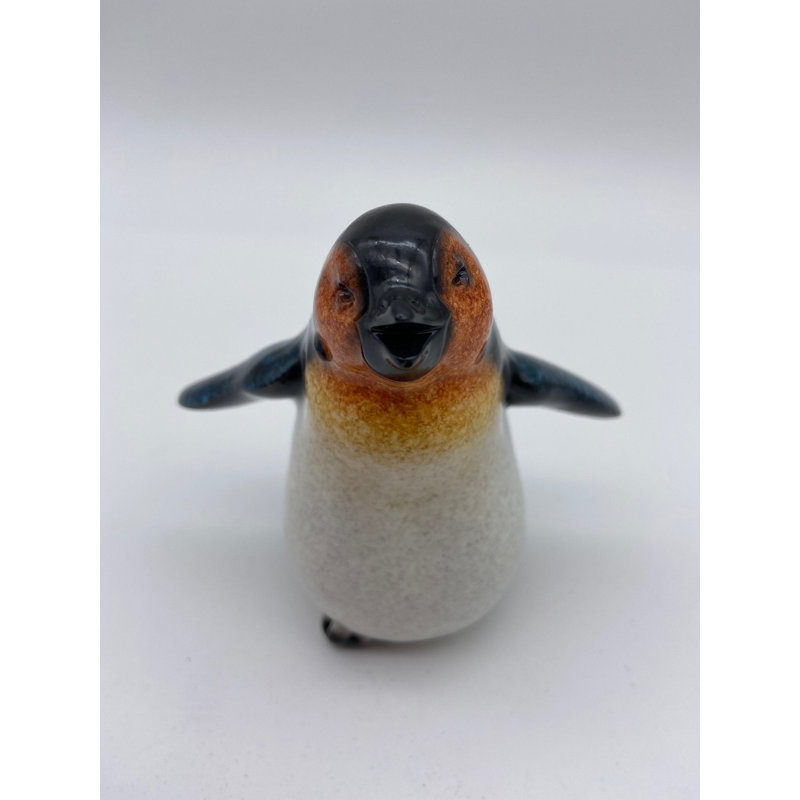 Figurine glacée petit pingouin heureux