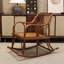 Chaise berçante en rotin naturel