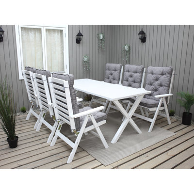 Renick 6 - Person Rectangular Solid Wood Patio Dining Set with Cushions included