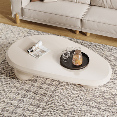 Khattab 51.2" Modern Three Legged Solid Wood Coffee Table