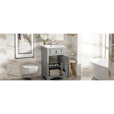Meuble-lavabo de 20 pouces avec lavabo en céramique, porte à fermeture en douceur et dossier ouvert pour les petits espaces de commodité de conception moderne