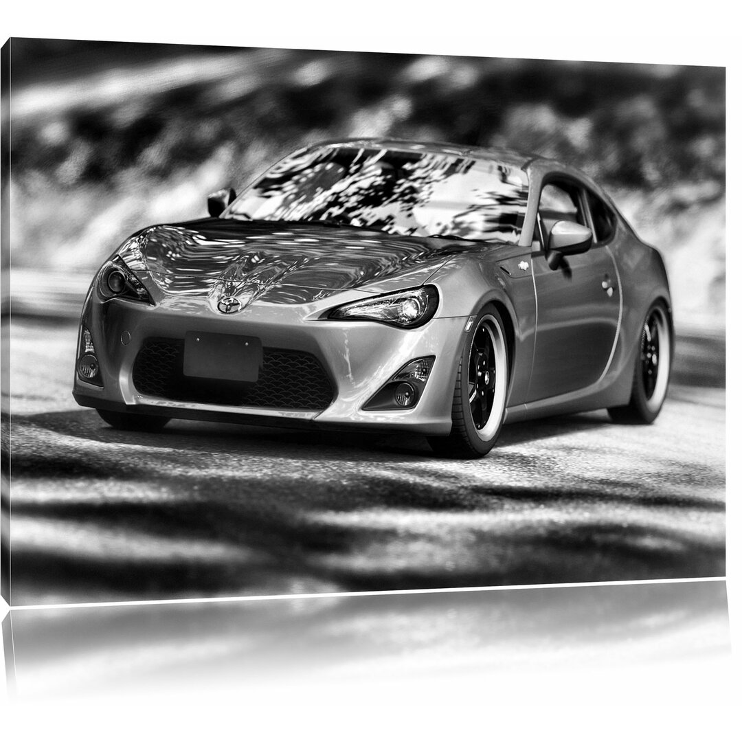 Leinwandbild Oranger Toyota FT-86 in Monochrom