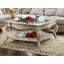 Table basse en verre transparent et finition taupe antique