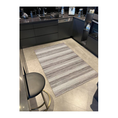 Tapis lavable moderne à motif peint à motif brun moderne