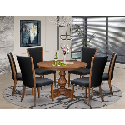 L'ensemble de salle à manger 7 pièces comprend une table de cuisine ronde de 48 po avec piédestal et 6 chaises rembourrées en tissu noir, noyer antique
