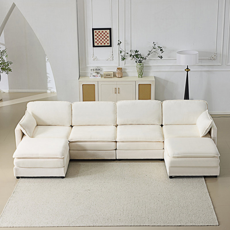 Canapé modulaire 4 places avec 2 repose-pieds et 2 coussins décoratifs