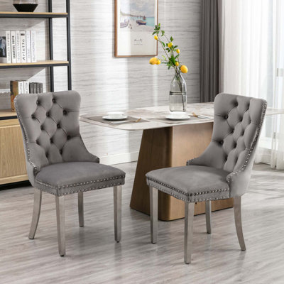 Chaise rembourrée capitonnée en velours de bois massif
