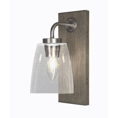 Oxbridge Wall Sconce Shown In Graphite & Painted Distressed Wood-look Metal Finish With 4.5” Square Clear Bubble Glass