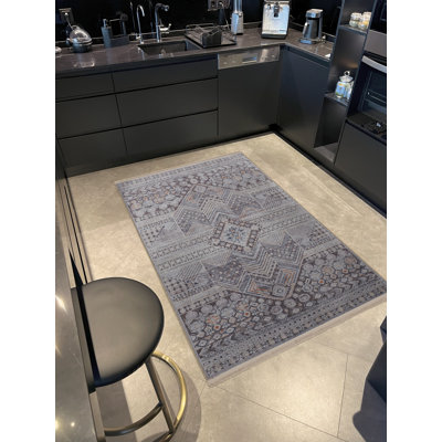 Tapis décoratif à motifs géométriques mixtes