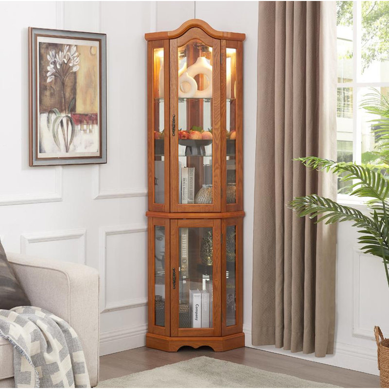 Enchanted by light, this Tempered Glass Display Curio Cabinet stands as a testament to elegance.