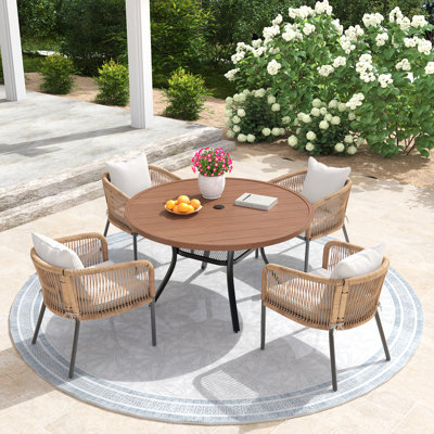 Ensemble de salle à manger d'extérieur pour 4 personnes avec table ronde de 120 cm et 4 chaises rembourrées en rotin en PE