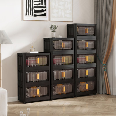 Armoire de rangement pliante polyvalente avec plusieurs niveaux, portes magnétiques, roulettes, idéale pour organiser divers espaces dans votre maison