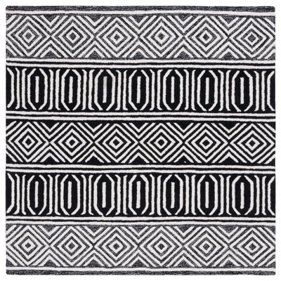 Tapis ivoire / noir Capri 702