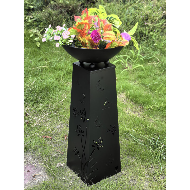 Pot à fleurs en métal avec éclairage solaire