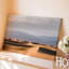 Toile, «A Vast Desert Landscape Under A Soft Overcast Sky», art mural avec Dunes de sable qui créent une douce vague-264314072