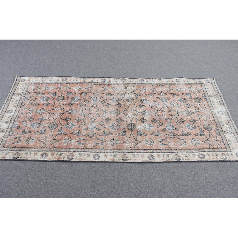 Handwoven Turkish Vintage Accent Rug in Orange Wool Perfect for Kitchen or Entryway Incorporating Modern Minimalist Design Aesthetics
