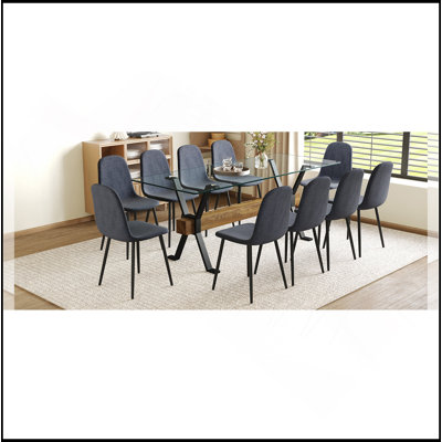 Ensemble de table et de chaises 79 po x 31,5 po avec pieds de table en métal noir en forme de X, traverse en panneau de fibres à densité moyenne à grain de bois texturé. Assorti de 10 chaises en tissu Lnen gris foncé. Pieds de pulvérisation en tube de fer.