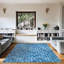 Tapis bleu à motif géométrique-847203144