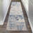 Corpuz Abstract Blue/Cream Area Rug-326925419