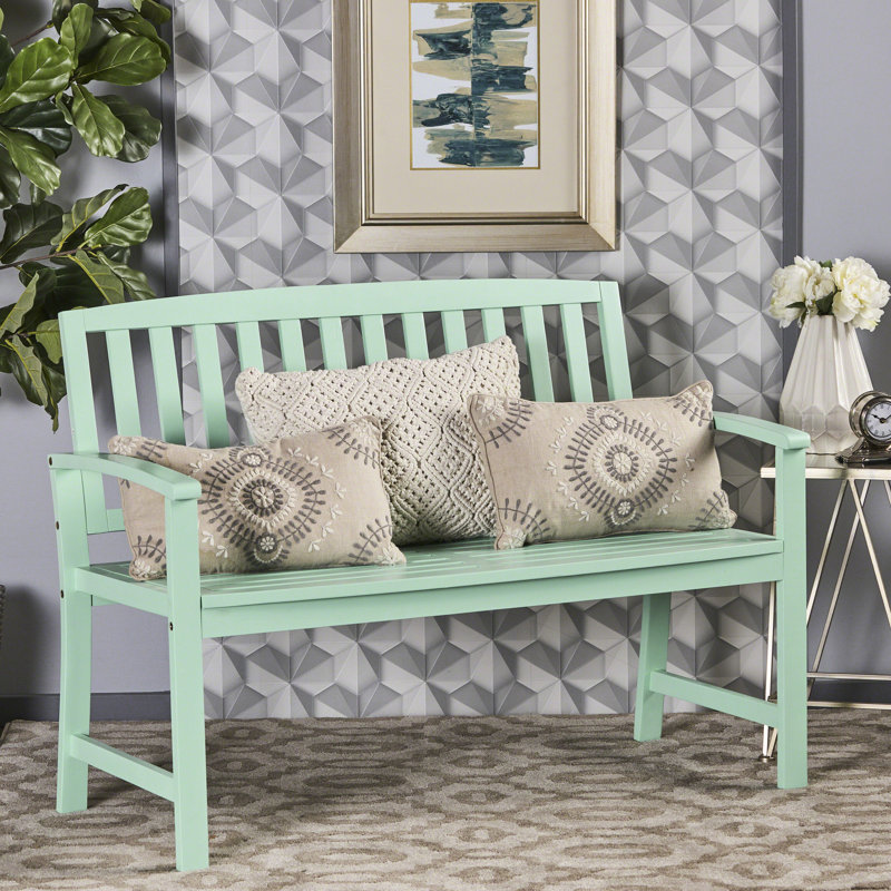 Banc charmant en bois couleur menthe pour l'intérieur et l'extérieur, ajoutant une touche d'élégance à votre espace.
