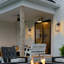 Matte Black Outdoor Wall Lantern with Cylinder Clear Glass Shade