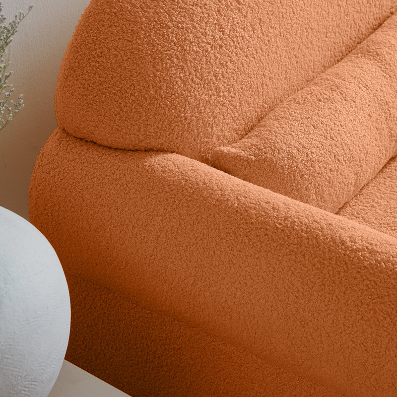 Fauteuil bouclé à la mode orange avec coussin lombaire pour une zone de lecture confortable - somptueux tissu, fabrication robuste, laine d'agneau contemporaine polyvalente, élément robuste