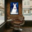 Lapin de Noël blanc avec nœud papillon sur fond enneigé-954056278
