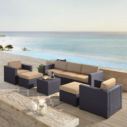 Arbedella 7 Piece Rattan Sectional Seating Group with Cushions