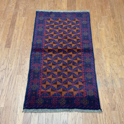Tapis orange / bleu marine Hilario