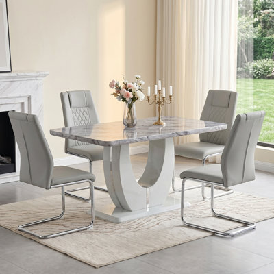 Holloman Modern Rectangular Marble Finish Dining Set with O-Shaped Pedestal and Faux Leather Chairs