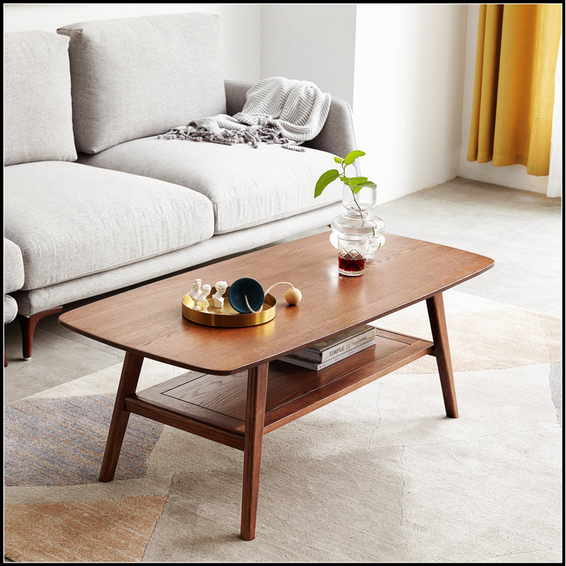 Table basse robuste en bois de chêne massif, finition naturelle, parfaite pour les salons modernes et traditionnels, durable et élégante.