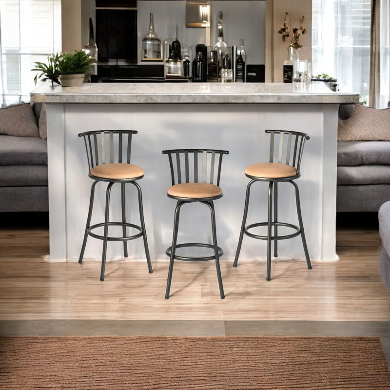 Ensemble de trois chaises de bar pivotantes à dossier bas en fer et en similicuir brun et noir
