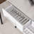 Kitchen Island With Stainless Steel Top, Open Shelves, And Drawers-225757130