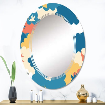 Nuage rouge, bleu et jaune avec petits oiseaux - miroir mural à motif ovale