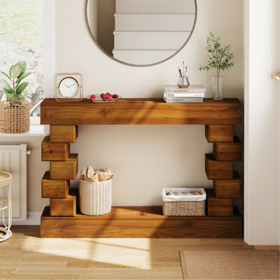 Console géométrique en bois empilé, table d'appoint sculpturale moderne pour entrée, salon ou couloir, avec une finition naturelle chaleureuse.