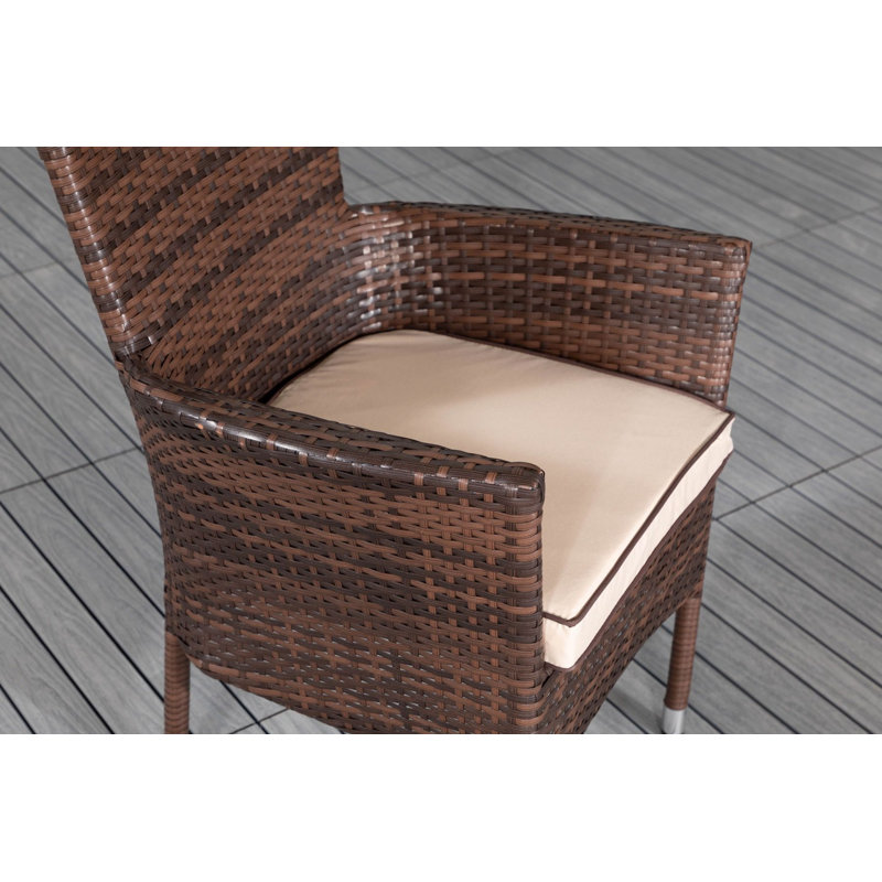 Escobar 4 - Person Patio Dining Set with Round Table , Cushions Included