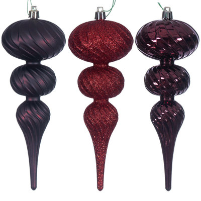 Assortiment d'ornements en forme de tourbillon argenté de 8 po. Deux mat, deux brillants et deux paillettes.