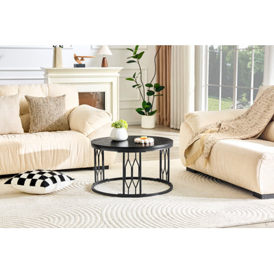 Table basse ronde en panneau de fibres à densité moyenne de 27,5 pouces de diamètre. Une table basse ronde pour le salon avec un design industriel rustique, avec des pieds en métal robustes et un assemblage facile.