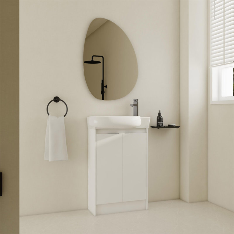 Meuble-lavabo autoportant de 23 pouces avec lavabo en céramique et portes à fermeture douce, parfait pour les salles de bain modernes et compactes