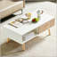 Table basse rectangulaire avec pieds en bois massif, tiroir coulissant pour le rangement et design moderne pour le salon