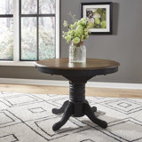 Judique Extendable Round Solid Wood Dining Table
